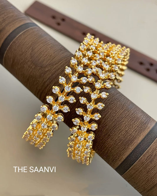 TRADITIONAL DIAMOND SETTING AD BANGLES